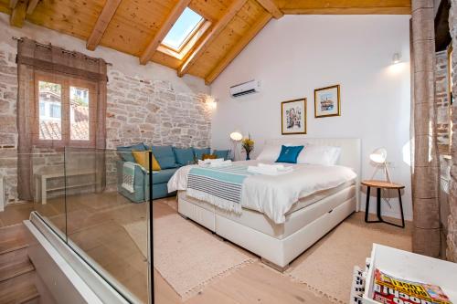 En eller flere senge i et værelse på Studio First Row to the Sea