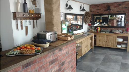 Køkken eller tekøkken på Dom Wczasowy Dorja