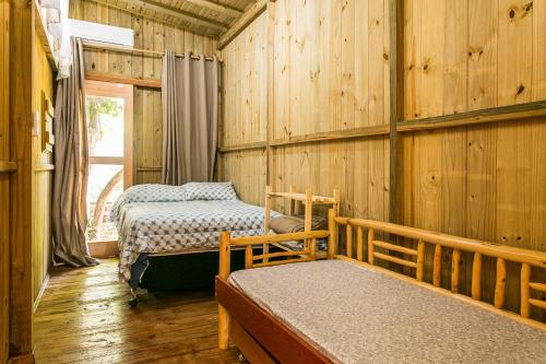 Postel nebo postele na pokoji v ubytování Pousada Guarda Beach House