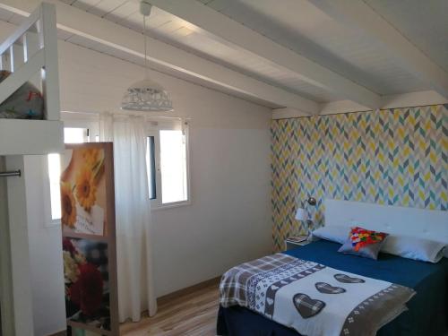 Postel nebo postele na pokoji v ubytování casapueblo