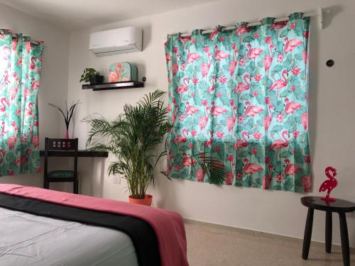 Postel nebo postele na pokoji v ubytování Casa Tropical