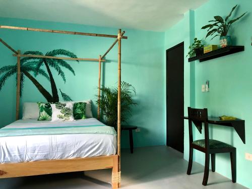 Postel nebo postele na pokoji v ubytování Casa Tropical