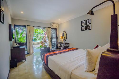 Katil atau katil-katil dalam bilik di The Lokha Legian Resort & Spa