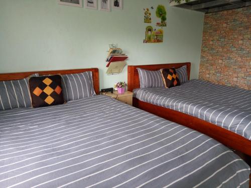 Giường trong phòng chung tại Sapa Tatu Homestay