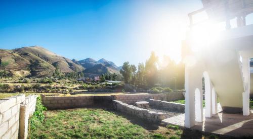 a building with a view of a mountain at Le Foyer Colca in Yanque