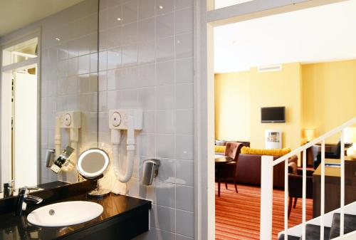 Ванная комната в Amrâth Grand Hotel de l’Empereur