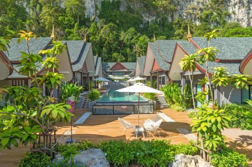 a resort with a pool and some buildings at The Scene Cliff View Villas in Ao Nang Beach