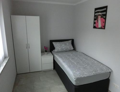 Postel nebo postele na pokoji v ubytování Zimmer Enzjan