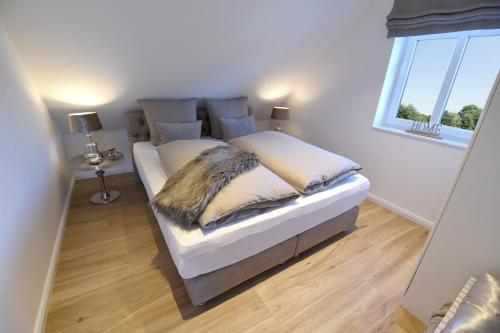 Cama o camas de una habitación en Seeblick-Norddeich