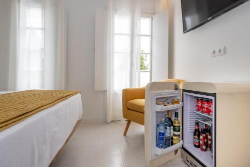 Hotel m - 27にあるテレビまたはエンターテインメントセンター