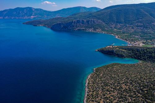 an aerial view of a large body of water at marilena in Néa Epídhavros