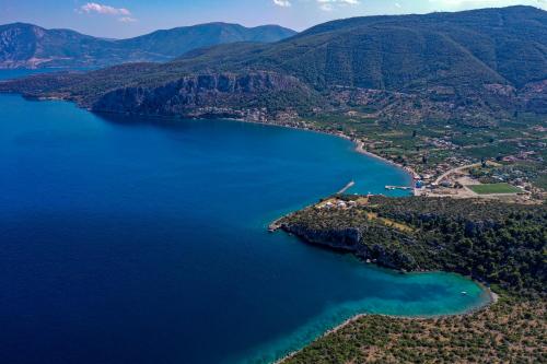 an aerial view of a large body of water at marilena in Néa Epídhavros