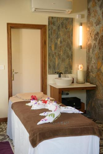 Postel nebo postele na pokoji v ubytování Anelia Resort & Spa