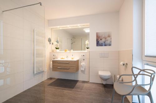 Et badeværelse på Appartement "Dünentraum" - Oase am Haff