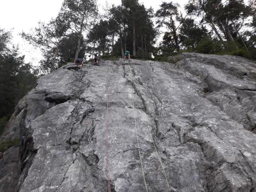 a group of people on top of a large rock at Apart Lechtraum in Stanzach