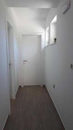Gambar di galeri bagi Apartments Šišević - Comfort Apartments with Balconies and Sea View di Slano