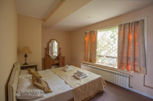 Llit o llits en una habitació de Caravan Villa