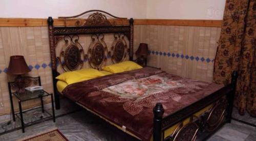 Postel nebo postele na pokoji v ubytování UK Lodge