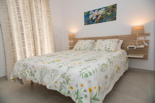 Ένα ή περισσότερα κρεβάτια σε δωμάτιο στο Ca sa Padrina Barruana