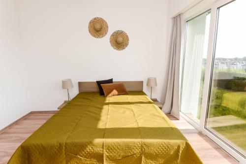 Cama ou camas em um quarto em Atsipūskit