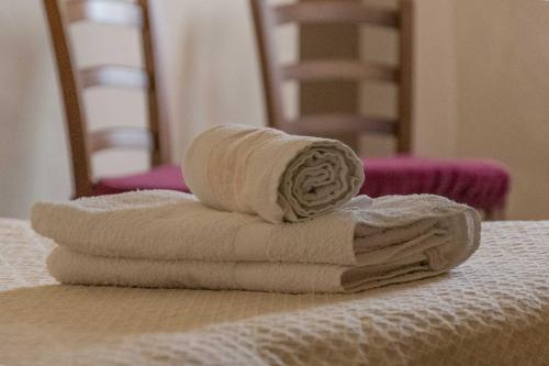Postel nebo postele na pokoji v ubytování Agriturismo La Ripolina