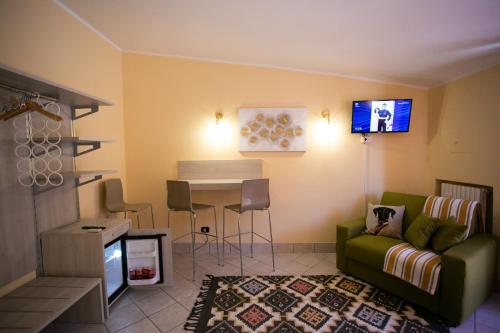 a living room with a couch and a table at B&B Trepo in Tropea
