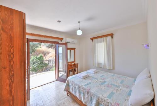 Postel nebo postele na pokoji v ubytování Nirvana Apartments