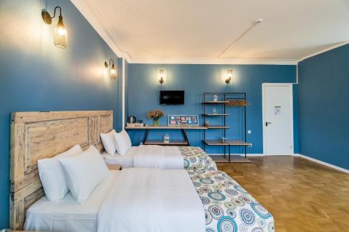Una cama o camas en una habitación de Gvino Minda