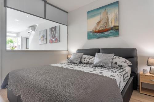 Postel nebo postele na pokoji v ubytování Apartments Amore