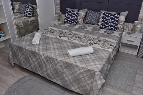 Posteľ alebo postele v izbe v ubytovaní Guest House Plavas