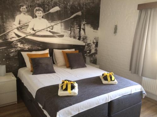 Ліжко або ліжка в номері Villa van Brienen