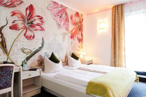 Кровать или кровати в номере Hotel Skada City Cölln