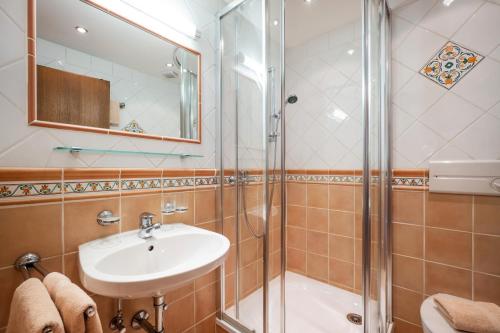 Koupelna v ubytování Appartements Schwaighofer