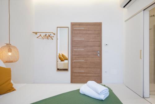 Ένα ή περισσότερα κρεβάτια σε δωμάτιο στο Twins Idola Apartments