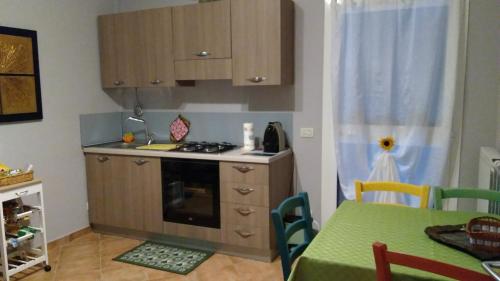 O bucătărie sau chicinetă la La porta del Sole