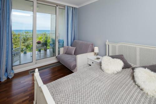 Posteľ alebo postele v izbe v ubytovaní Apartament Playa Baltis 66 z widokiem na morze