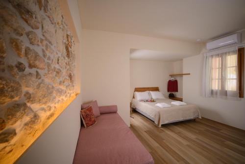 Кровать или кровати в номере Veranda Rossa Suites