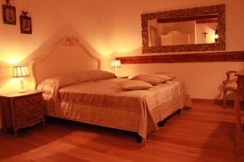 Letto o letti in una camera di Rigoletto Charm