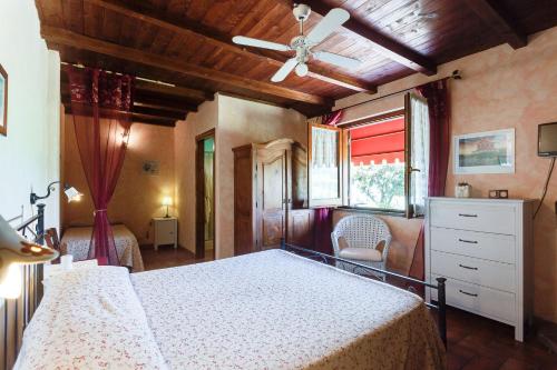 Postel nebo postele na pokoji v ubytování Agriturismo Casale Sasso