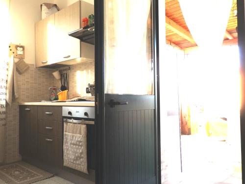 Kuchyň nebo kuchyňský kout v ubytování Casa Terrazzata in centro