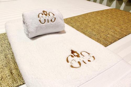 Studio 69 Aparthotelにあるベッド
