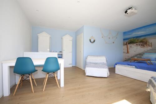 Ένα ή περισσότερα κρεβάτια σε δωμάτιο στο B&B Beach&Bos