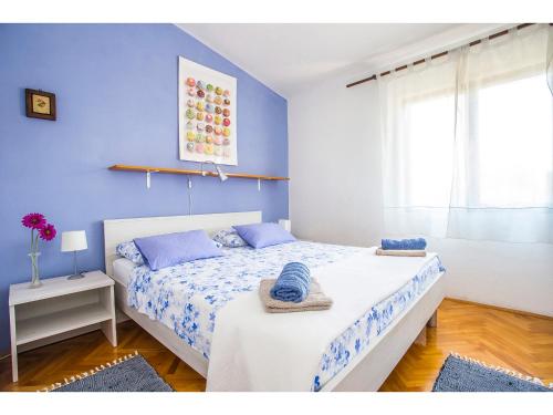 Ένα ή περισσότερα κρεβάτια σε δωμάτιο στο Apartment Bartul