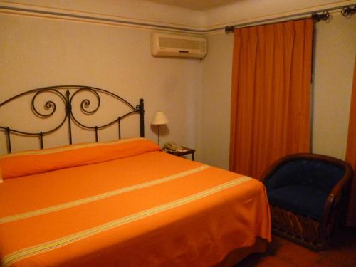 Katil atau katil-katil dalam bilik di Hotel Boutique Parador San Miguel Oaxaca