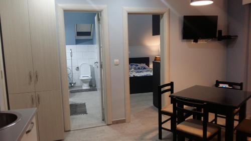 TV a/nebo společenská místnost v ubytování Apartments Sovran Vila Marija