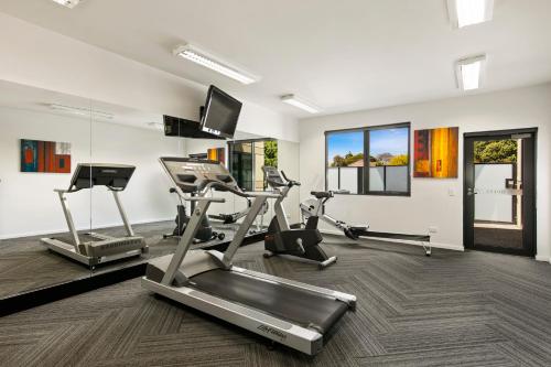 a gym with three treadmills and cardio machines at Quest Moorabbin in Moorabbin