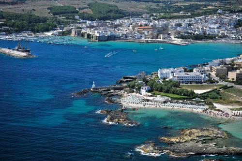 an aerial view of a city and the ocean at Dimora Duchessina Suites de Charme in Minervino di Lecce