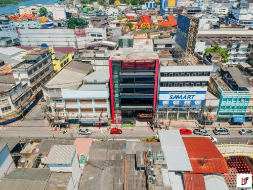 an aerial view of a city with buildings at The Harbour Front Hotel in Suratthani