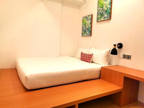 Homy Seafront Hostelにあるベッド