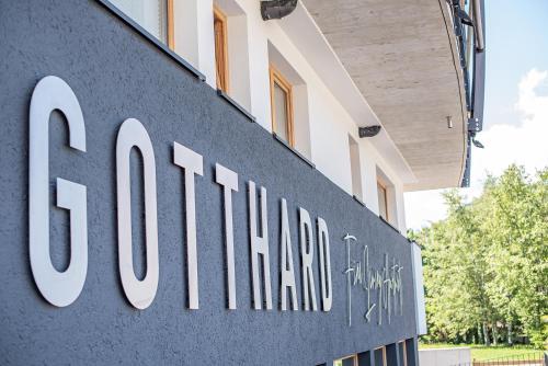 a sign on the side of a building at GOTTHARD - FINE LIVING APARTMENTS in Seefeld in Tirol